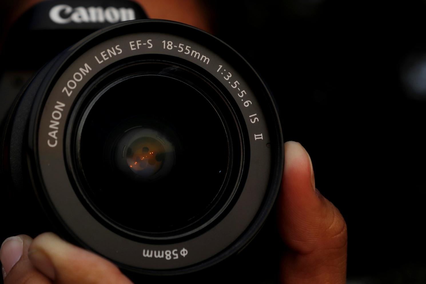 Professional editing workstation with dual monitors displaying timeline and preview